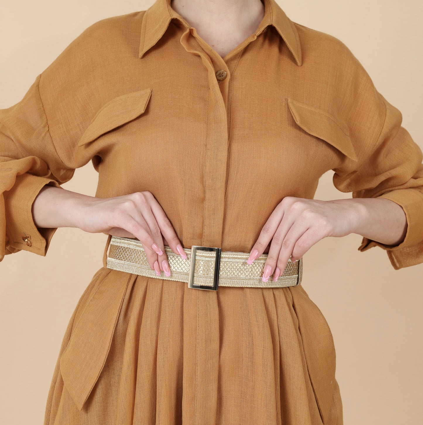 Honey-colored dress with a traditional touch, made from men's bisht and tieb wool